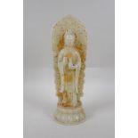 A Chinese reconstituted hardstone figure of Guan Yin, 28cm high