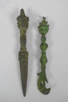 A Tibetan cast iron phurba and kartika with ver de gris patina, 21cm long