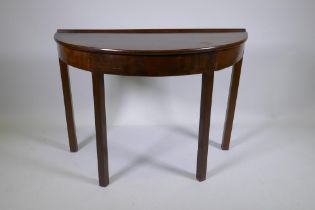 A C19th mahogany demi lune side table, raised on square supports, 103 x 46 x 72cm