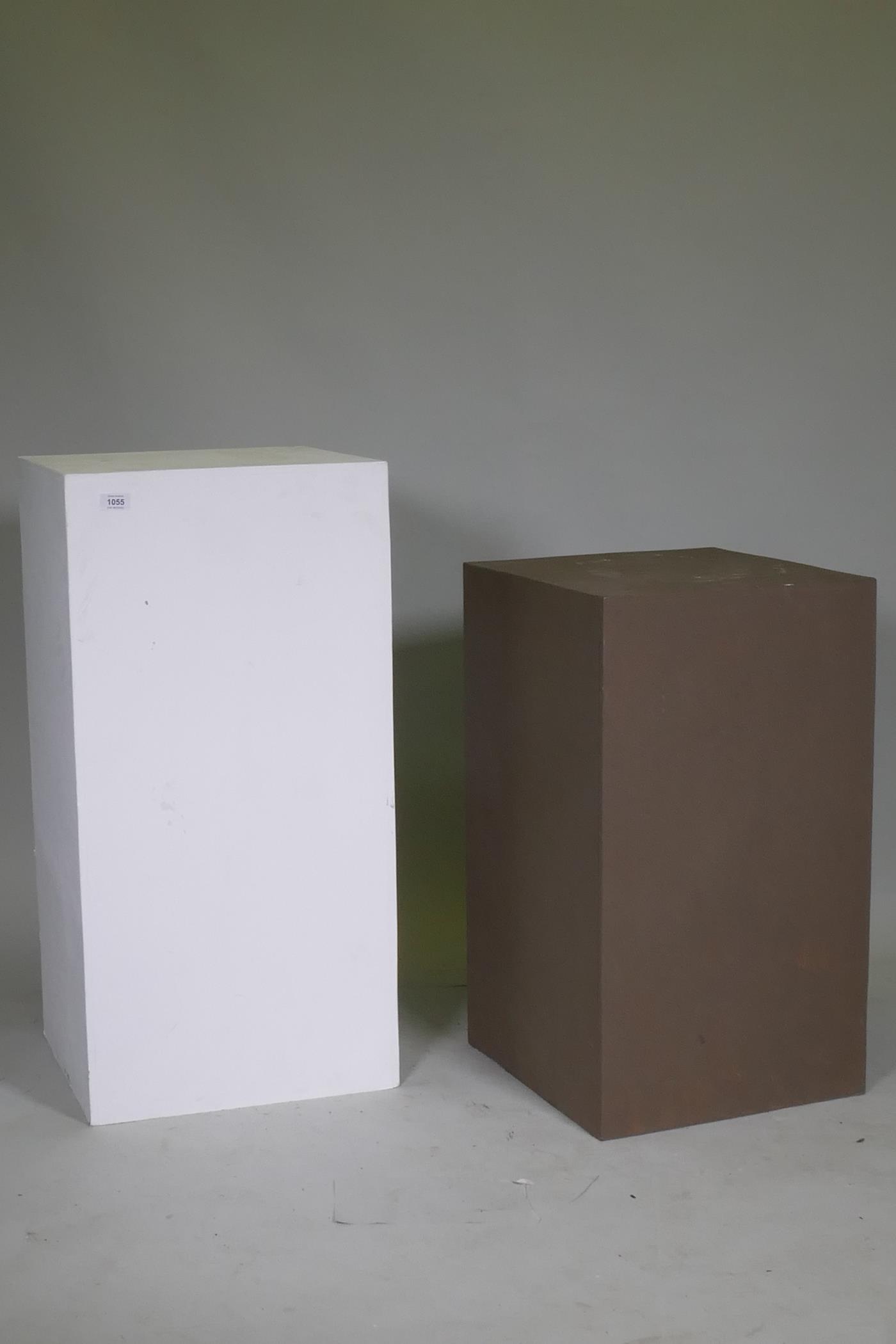 Two contemporary painted exhibition display plinths, largest 42 x 42 x 85cm