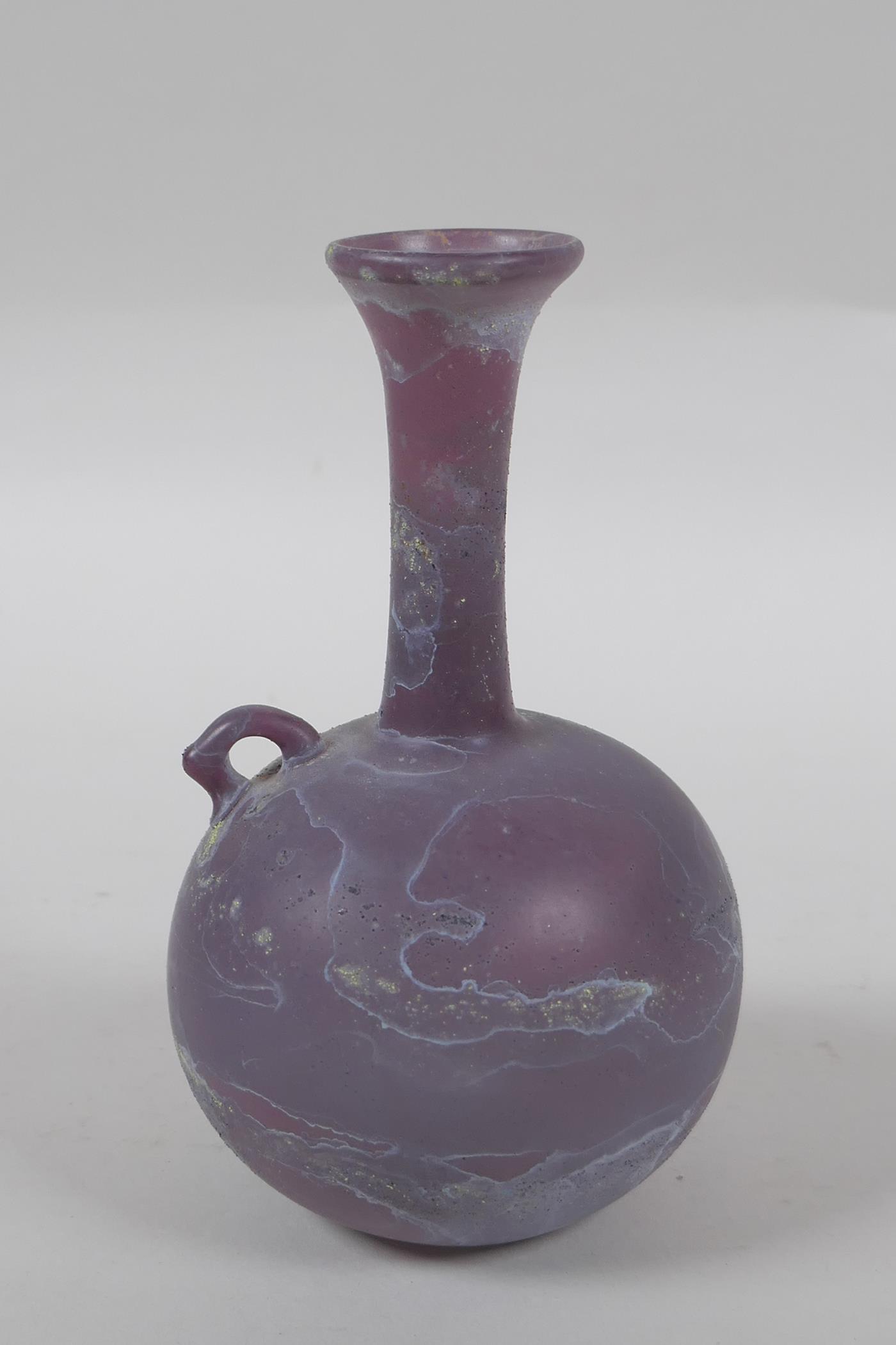 An antique purple glass bottle, 14cm high - Image 3 of 4