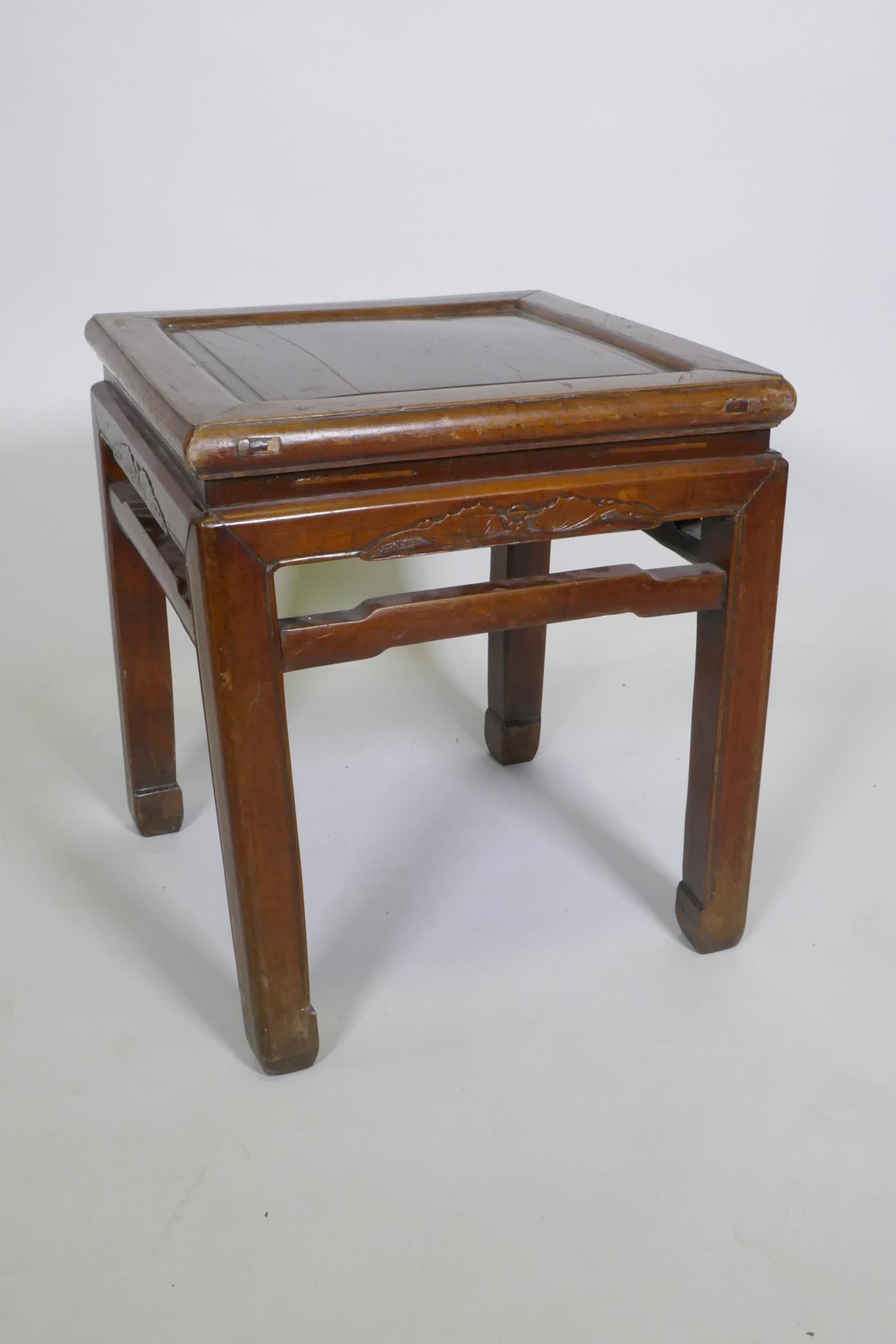 A Chinese hardwood occasional table with carved bat decoration, 45 x 45cm, 50cm high