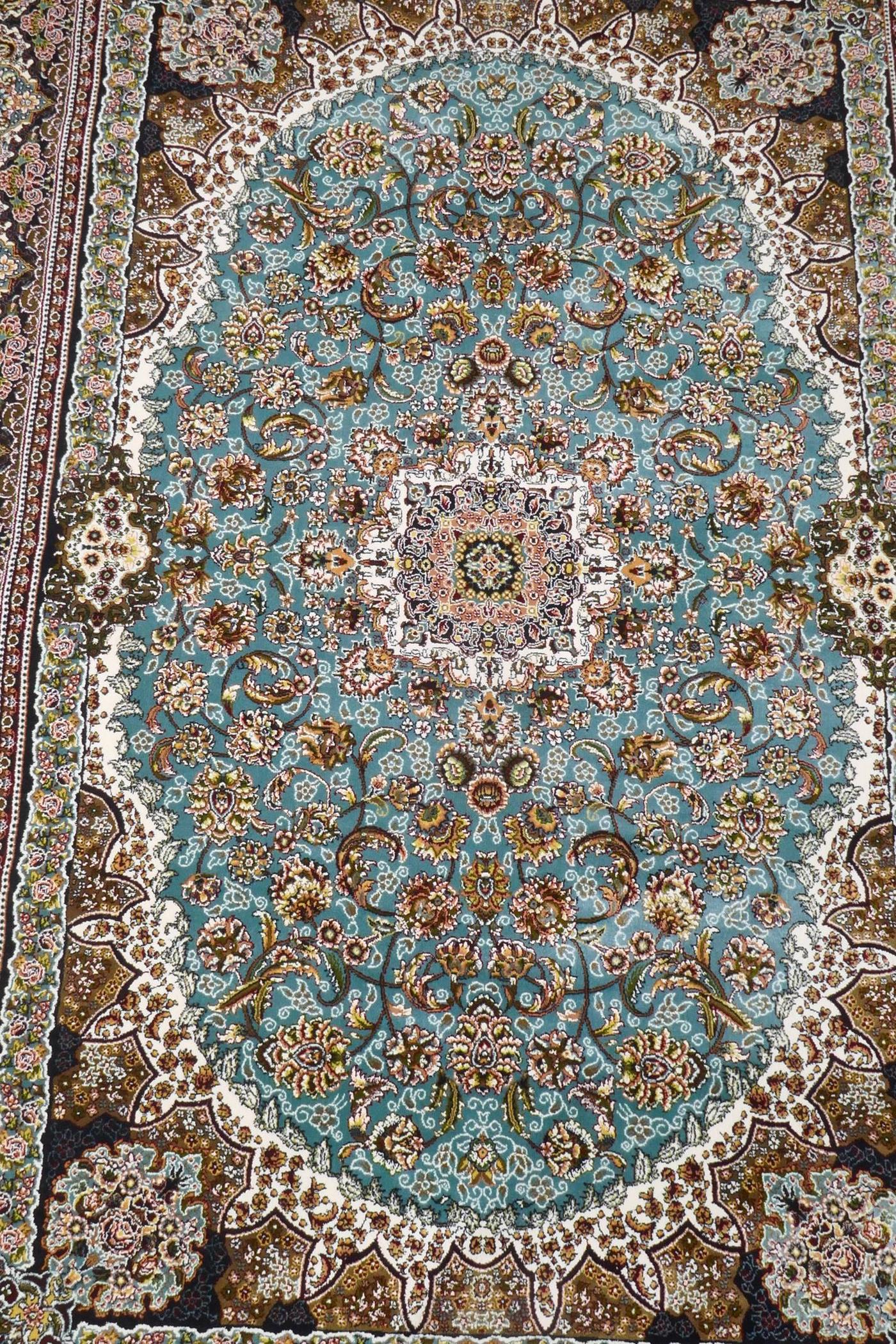 A fine woven full pile Iranian carpet with traditional floral medallion design on a turquoise field, - Image 4 of 5