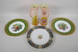 A pair of Royal Art Pottery style jugs and three collector's cabinet plates, 28cm diameter