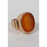 An antique intaglio ring, with finely carved inset stone in an antique high carat gold mount, approx