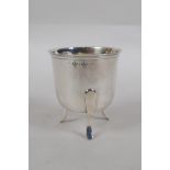 An antique continental silver pot raised on tripod supports, 80.8g, probably French