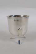 An antique continental silver pot raised on tripod supports, 80.8g, probably French