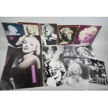 A quantity of Marilyn Monroe ephemera to include press photographs, lobby cards, posters,