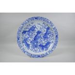 A blue and white porcelain charger with lobed rim and kylin decoration, Chinese KangXi 6 character