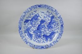 A blue and white porcelain charger with lobed rim and kylin decoration, Chinese KangXi 6 character