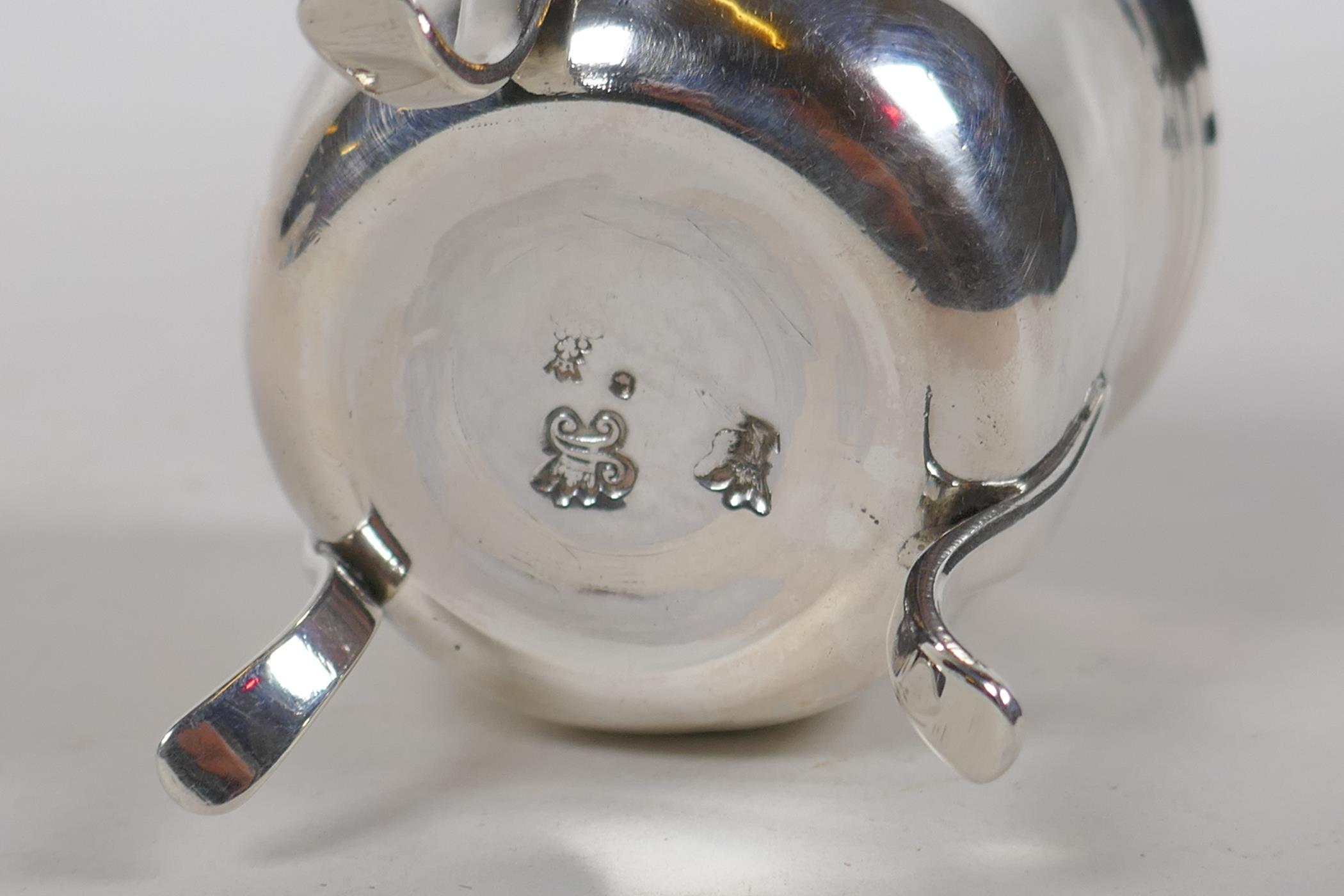 An antique continental silver pot raised on tripod supports, 80.8g, probably French - Image 4 of 5