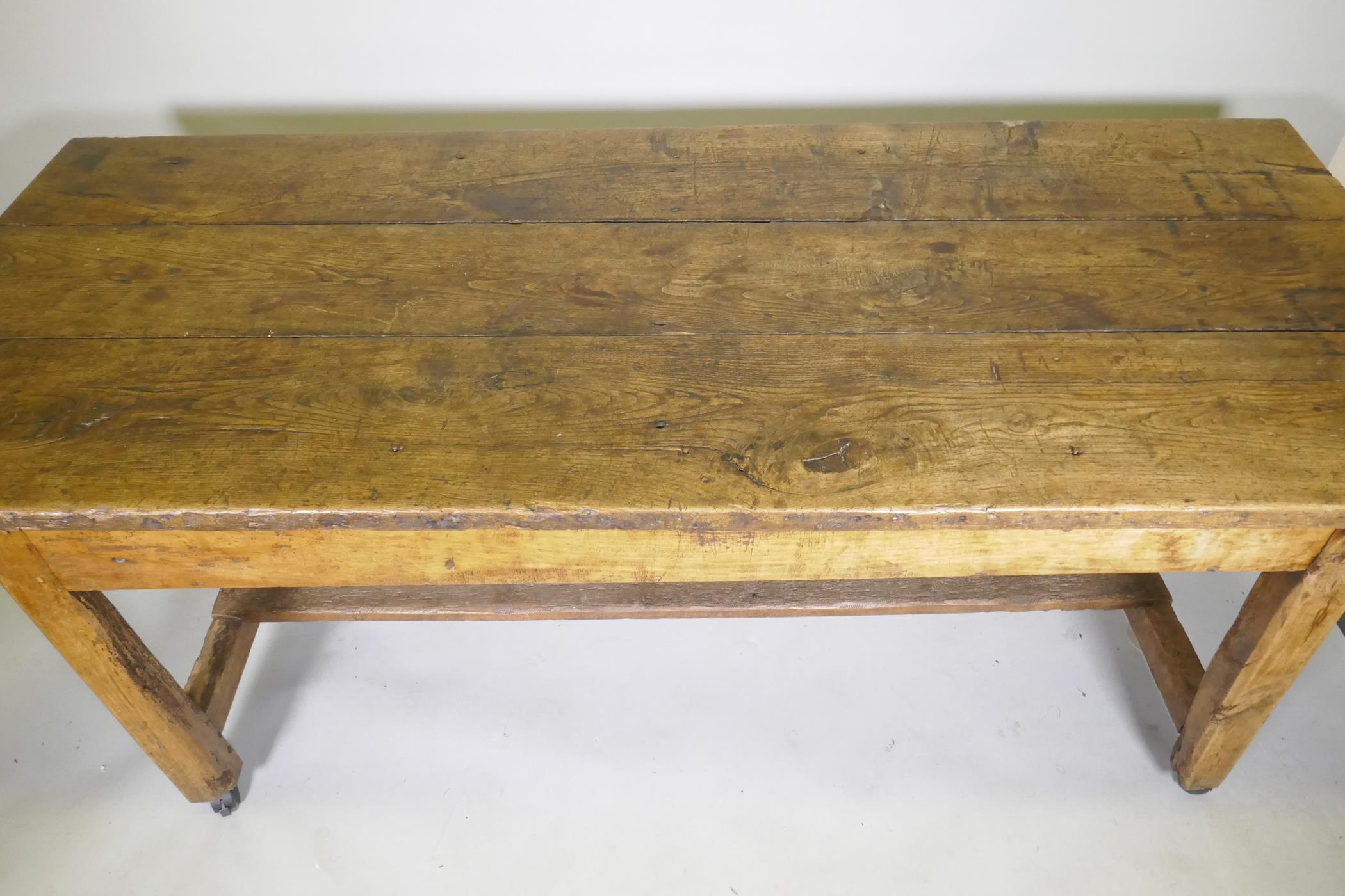 An C18th fruit wood refectory table with oak planked top and raised on square chamfered supports - Image 3 of 4