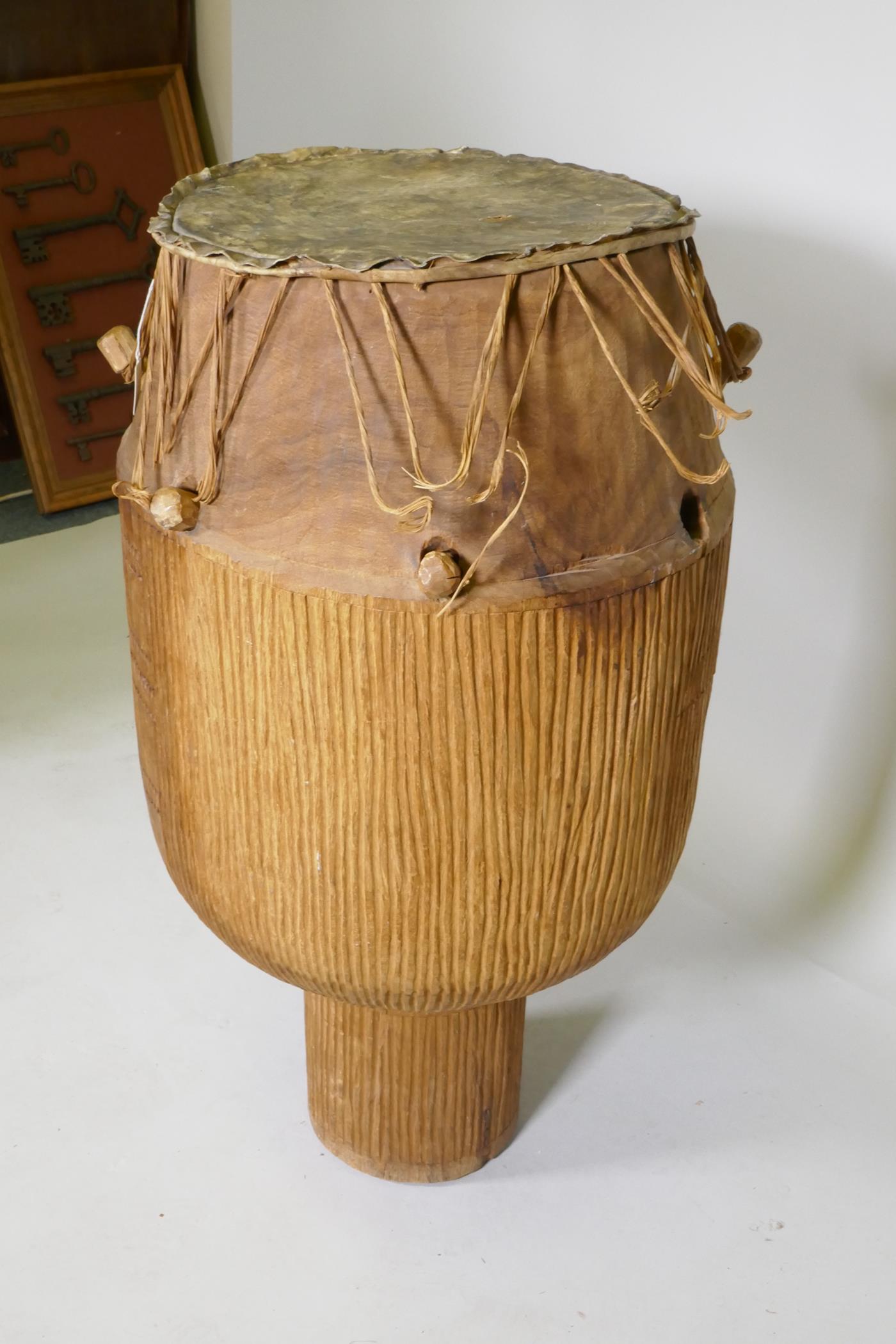 An African Ashanti tribe Atumpan talking drum, 87cm high, 46cm diameter - Image 2 of 3