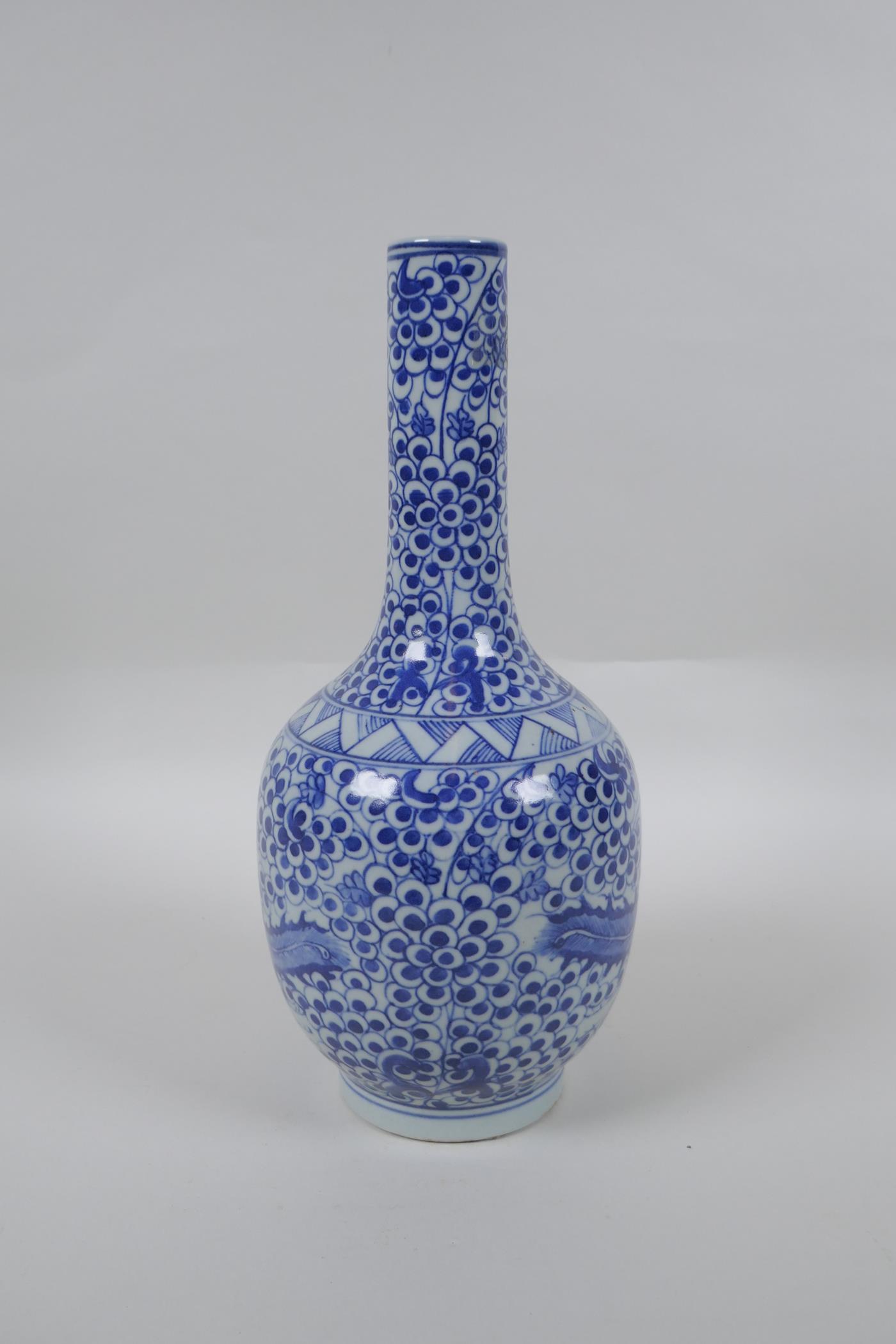 A Chinese blue and white porcelain bottle vase with phoenix decoration, mark to base, 29cm high - Image 4 of 5