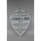 A vintage style James Purdey & Sons Ltd shield shaped enamel sign, 39 x 51cm