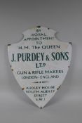 A vintage style James Purdey & Sons Ltd shield shaped enamel sign, 39 x 51cm