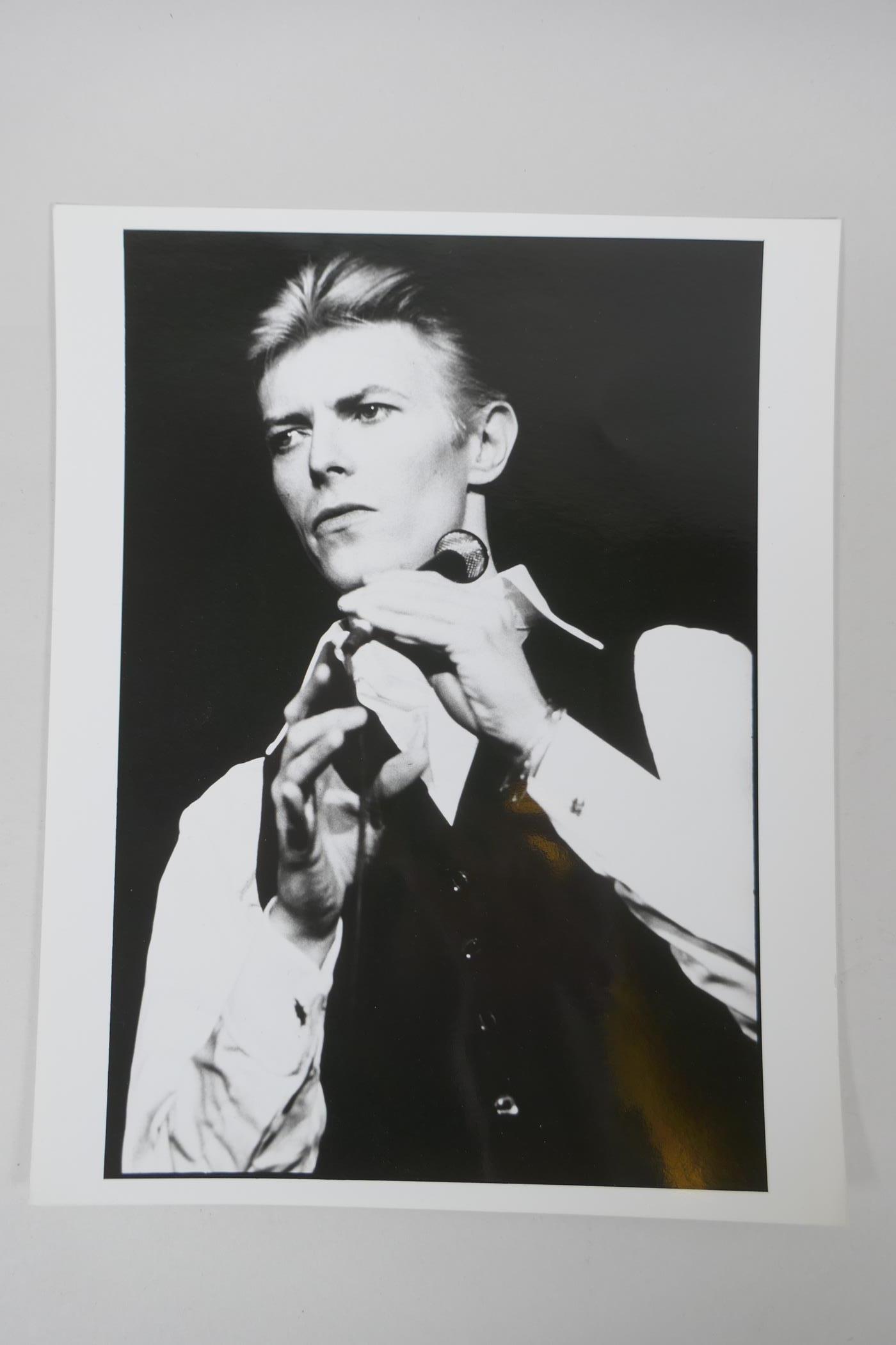Two 1970s black and white press photographs of David Bowie, with London Features International - Image 2 of 6