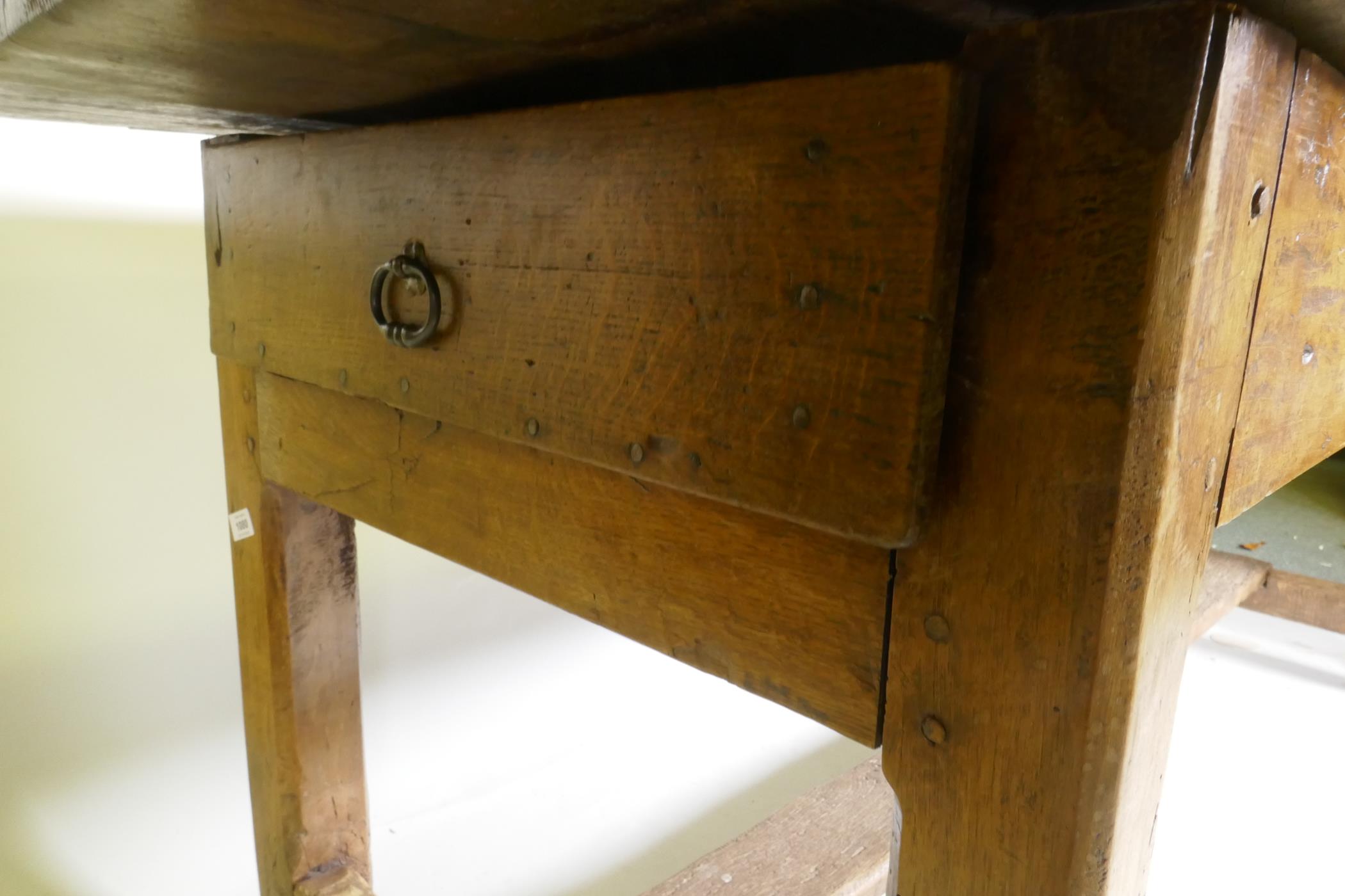 An C18th fruit wood refectory table with oak planked top and raised on square chamfered supports - Image 4 of 4