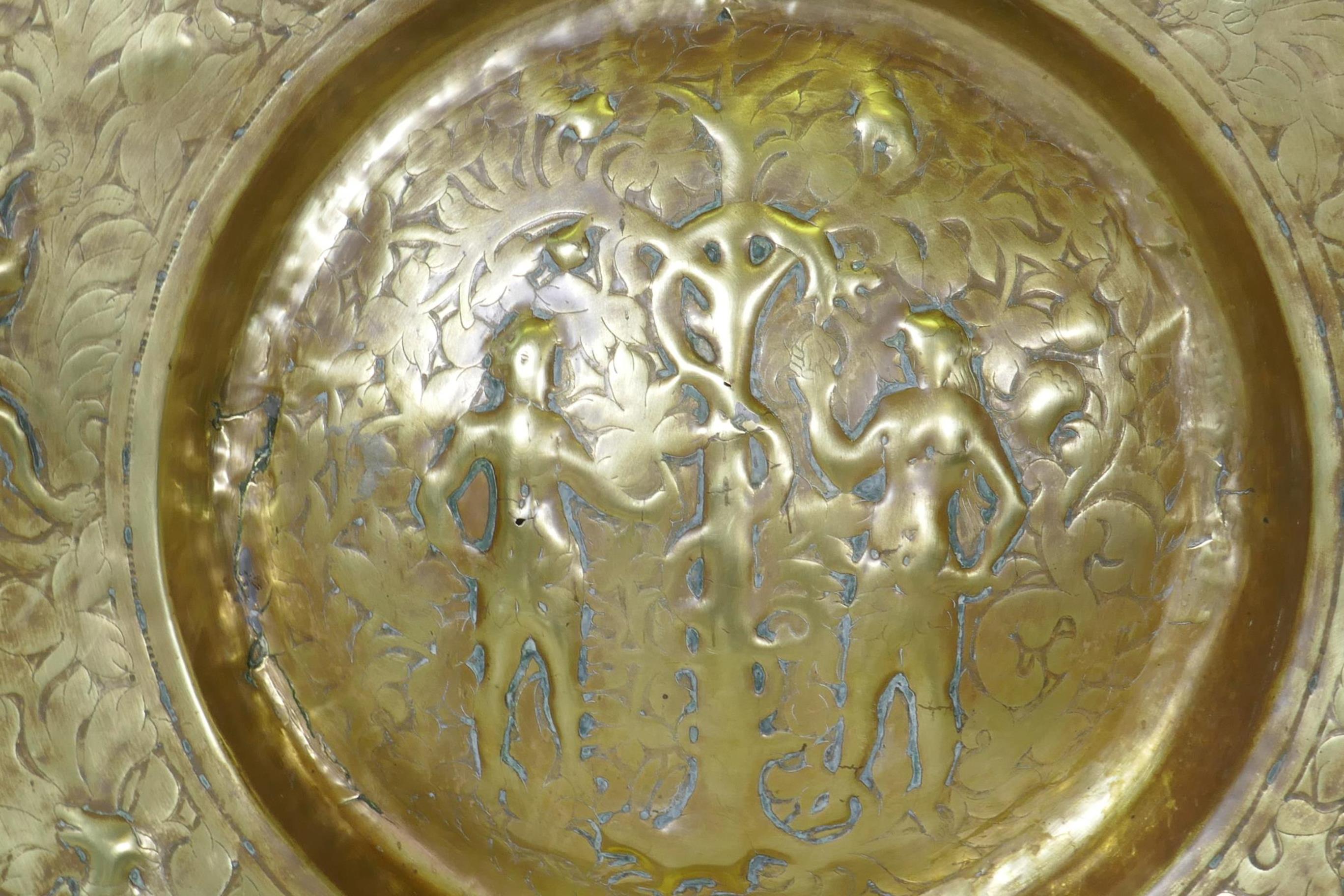A Nuremburg brass alms dish, the central field with a depiction of Adam and Eve with the Tree of - Image 2 of 3
