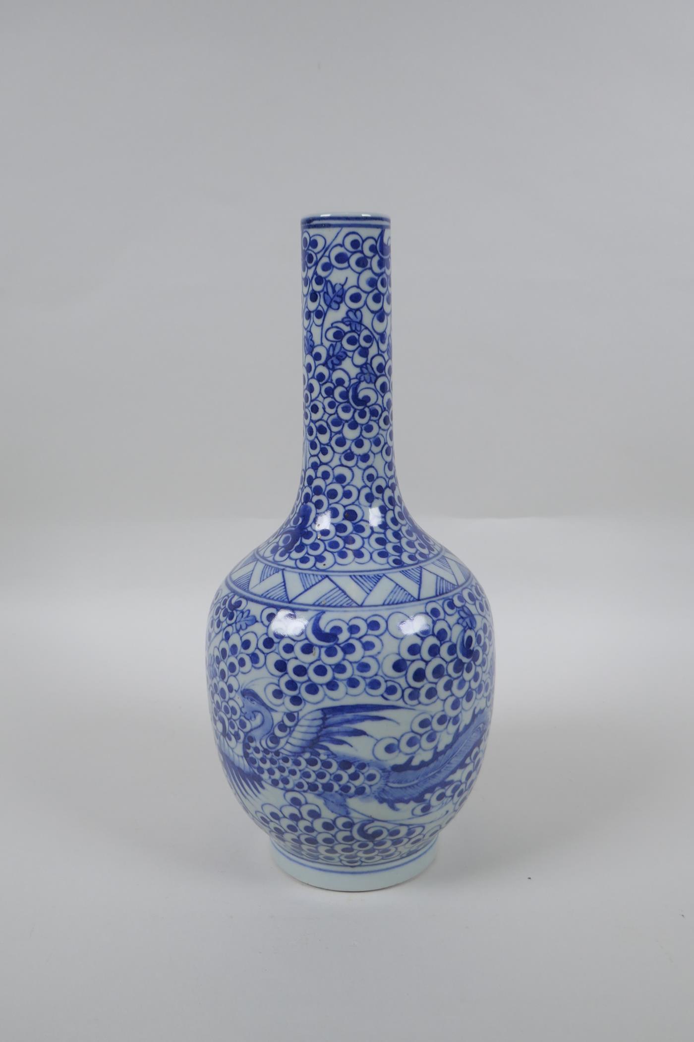 A Chinese blue and white porcelain bottle vase with phoenix decoration, mark to base, 29cm high - Image 3 of 5