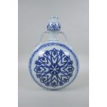 A Chinese blue and white porcelain garlic head shaped flask with two handles, 4 character mark to