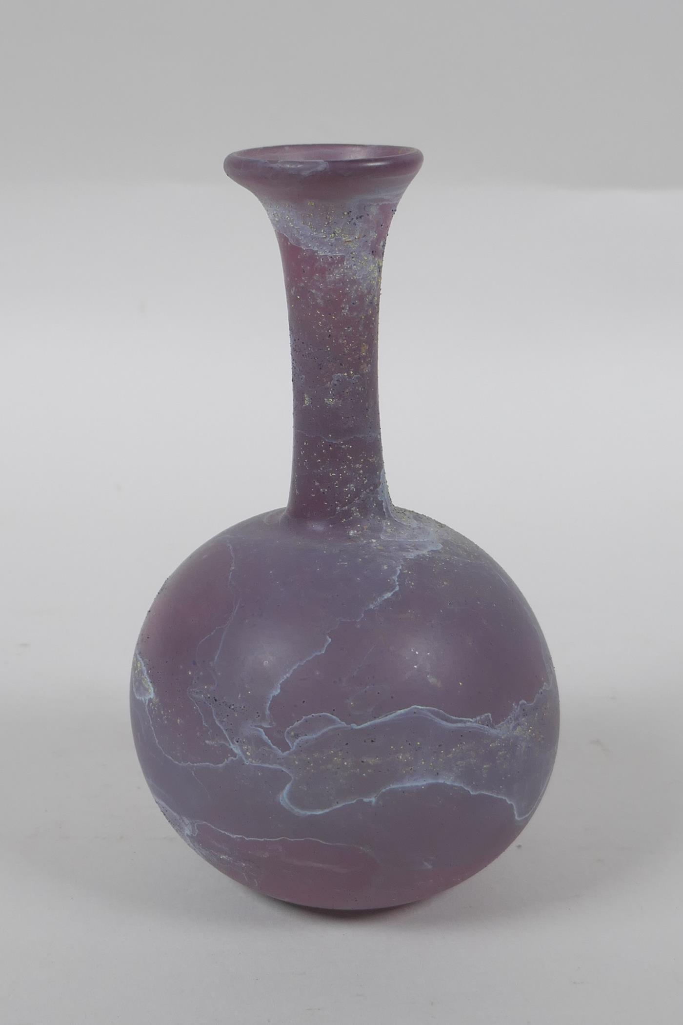 An antique purple glass bottle, 14cm high - Image 4 of 4