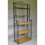 A folding metal pot rack with five wicker shelves, 80 x 42 x 186cm