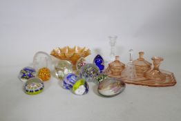 A collection of glass paperweights, including a Charles Sorrel Studio, carnival glass bowl, dressing