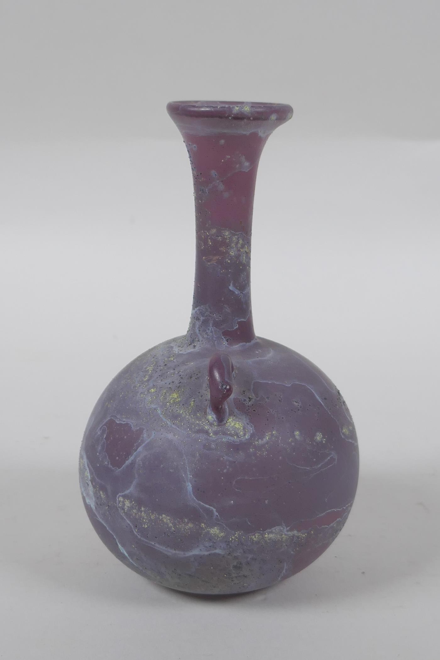 An antique purple glass bottle, 14cm high - Image 2 of 4