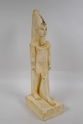 An Egyptian plaster figure of Ahmose, 40cm high
