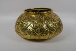 A C19th Iranian Qajar gilt brass pierced vessel, 32cm diameter