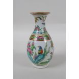 A late C19th Cantonese famille vert porcelain vase decorated with birds and butterflies amongst