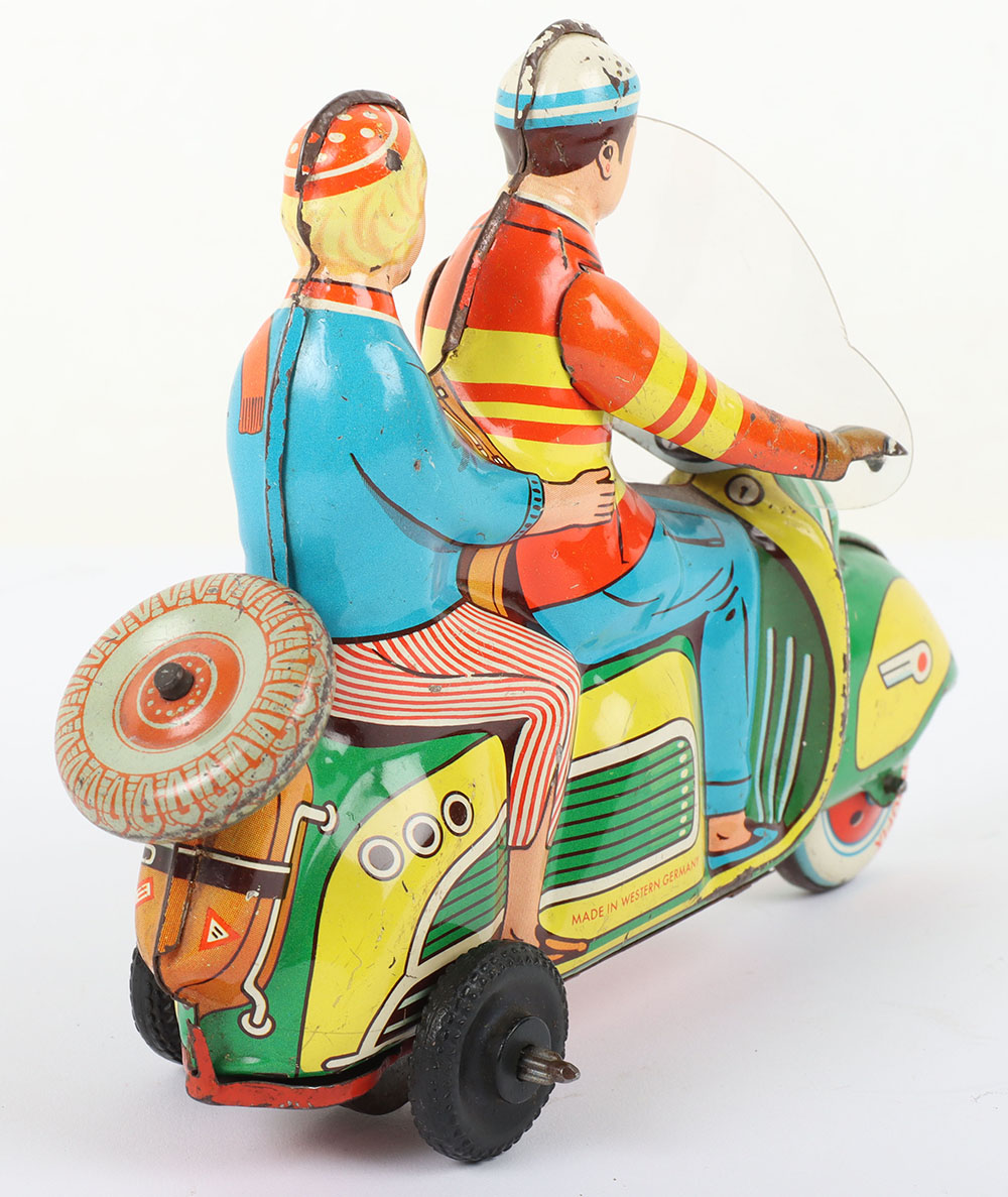 A Technofix friction driven Scooter Vespa with Lady passenger, German 1950s, - Image 5 of 7