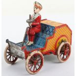 Rare Lehmann tinplate Buster Brown driving an open car, German for the U.S market circa 1910