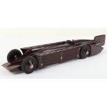 A good Ranlite Bakelite c/w model of H.Segrave’s Land Speed Record Golden Arrow, by A.G Ltd patented