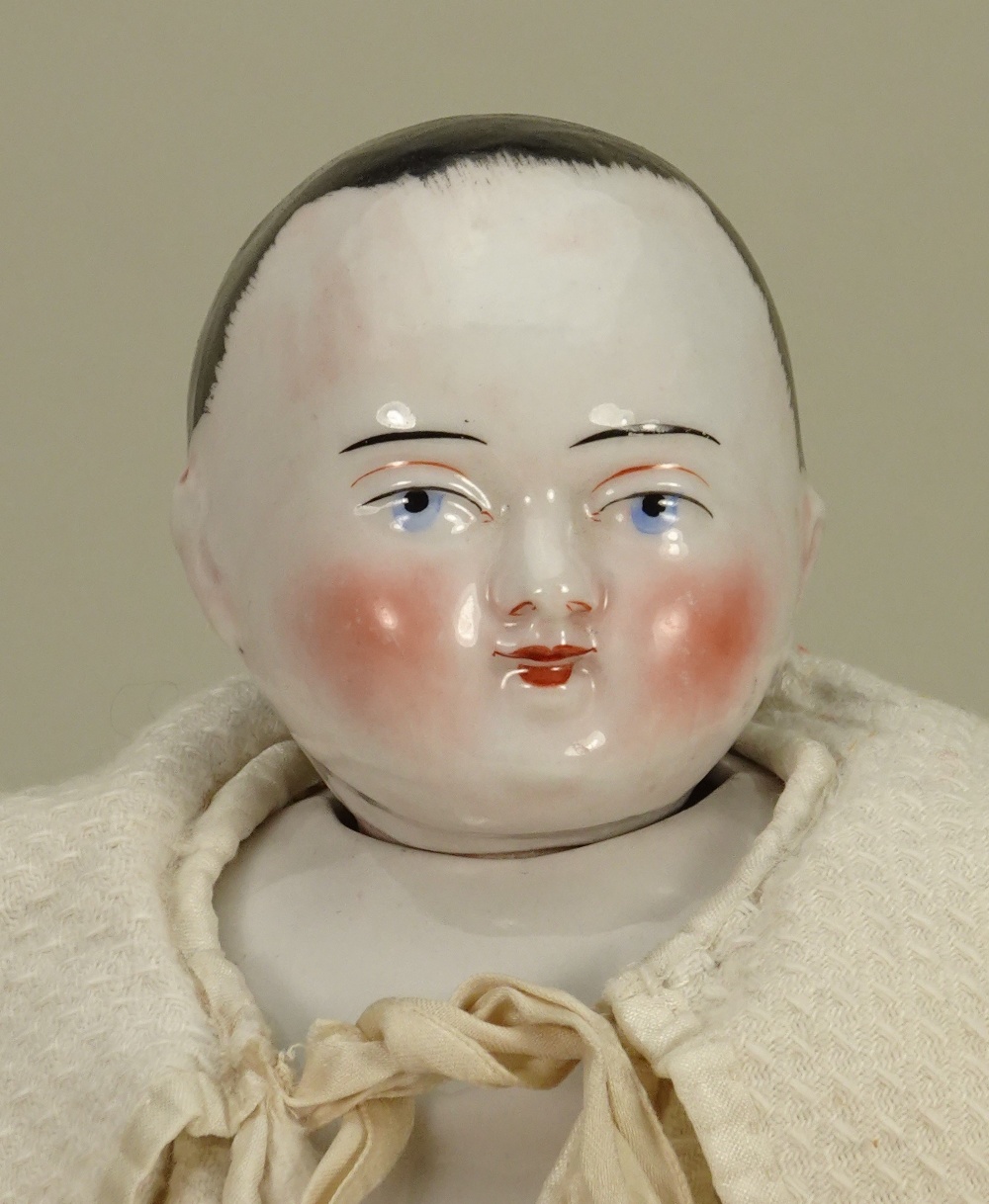 A rare glazed china Motschmann baby, German 1850s, - Image 2 of 3