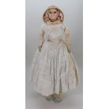 A wax over composition ‘Mad Alice’ shoulder head doll, English circa 1850,