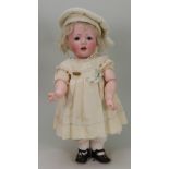 A rare and good J.D Kestner 245 ‘Hilda’ character bisque head toddler doll, German circa 1910,