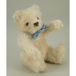 A small Steiff post-war white mohair Teddy bear,