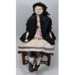 A large wax over composition shoulder head doll, English circa 1850,