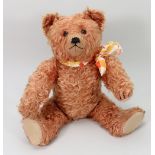 A Schuco apricot mohair Teddy bear, 1930s,