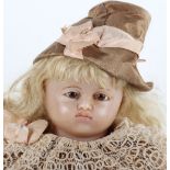 A good poured wax shoulder head doll in original clothing, 1870s,