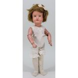 A Schoenhut ‘Miss Dolly’ carved wooden doll, American circa 1920,