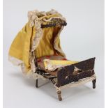 A rare mid-nineteenth century Ragged School Dolls House Bed with original canopy,