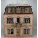 A Christian Hacker three storey dolls house, German circa 1900,