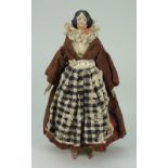 Early papier-mache shoulder head doll in original costume, German circa 1840,