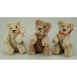 Three miniature post-war mohair Teddy bears,