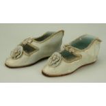 Pair of pale blue silk French Bebe doll shoes, w