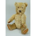 A golden mohair Chiltern musical Hugmee Teddy bear, 1950s,