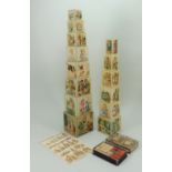 Two sets of ABC pictorial stacking cubes, German 1890s,